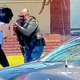 Illustration for article titled Video: US Marshal Rushes Woman Filming Him, Breaks, Kicks Camera